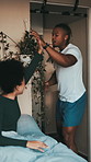 Couple, pull ups or high five in home for fitness achievement, clap or motivation with smile. African man, woman or exercise for support, count or fist pump to celebrate new pr for success in bedroom