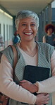 Teacher, face or woman in hallway with tablet, experience and pride in academic job. Confidence, laugh and mature female person in school with tech, service or career growth in learning industry.