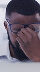 Eye strain, glasses or black man in office with laptop, tired or headache in task management. Screen fatigue, tech or employee in agency with migraine, reflection or vision discomfort in deadline.