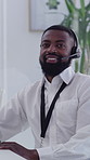Man, headset and face with computer at office, typing or consulting job at insurance agency. Person, advisor or broker with voip tech, contact or pc with smile for career at risk management company