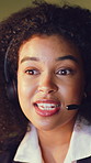 Happy woman, consultant and night with headset for customer service or online advice in office. Female person, agent or working late with mic for virtual assistance or web support in call center