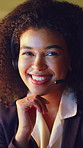 Happy woman, face and night agent with headset for online advice or customer service in office. Portrait, female person or consultant working late with smile for virtual assistance in call center