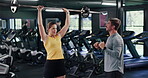 Barbell, personal trainer and fitness with woman in gym for weightlifting, strong and muscle workout. Training, coaching and bodybuilder exercise with people in sports center for powerlifter athlete
