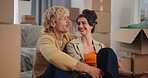 Couple, talking and planning in new home with boxes for moving, property investment or bonding together. Married people, smile and conversation in dream house with decoration idea, goals and support.