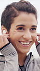 Fitness, earphones and athlete outdoor with smile, online radio or song subscription for start of workout. Happy, sport or woman outside with tech, streaming playlist or getting ready with audio app