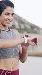 Exercise, earphones and woman with smart watch at beach for heart rate, fitness progress or results. Music, happy runner and technology for wellness stats, timer app and pace tracking for cardio