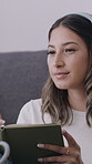 Creative, headphones and woman with notebook, lounge and streaming music for remote work and author. Home, writing and person with journal for freelance project, writer and subscription for audio