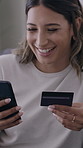 Happy woman, phone and online shopping with credit card for payment, banking or order in home. Female person, shopper or debit with mobile smartphone or smile for ecommerce or wireless transaction