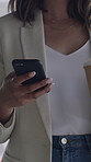 Business woman, hands and walking with phone for conversation, online chatting or social media. Closeup, female person or employee typing with mobile smartphone or app for web or texting in workplace