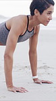 Fitness, push up and woman by beach for wellness, health or body training in morning for active. Workout, challenge and female person with exercise for core and arm strength by ocean for performance.
