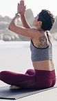 Woman, namaste and meditation for fitness on beach for spiritual healing, inner peace and self care. Female person, prayer and lotus pose for holistic balance, mindfulness technique and zen on ocean 