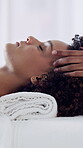 Spa, head massage or woman on bed with relax, stress relief or tranquility in holistic care. Wellness, calm or masseuse in center with scalp rub, comfort or tension removal in healing treatment.