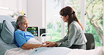 Sad, doctor and old woman in hospital bed, talking and comfort with healthcare. Pensioner, medical service and mature person in clinic, conversation and results with support, empathy and cancer