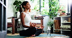 Relax, lotus pose and woman in home in morning for breathing, calm or yoga exercise for balance. Wellness, healing and person with chakra alignment for spiritual meditation in living room at house.