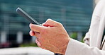 Hands, typing and employee with smartphone, city or communication for real estate update on website. Outdoor, realtor and person with mobile for chat, texting and networking with contact for schedule