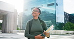 Woman, walking and student with books in city for education, learning journey or travel. Female person, thinking and academic learner with textbooks for scholarship, studying or commute in urban town