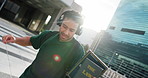 Dancing, headphones and student in town walking to university for education or learning. Happy, books and male person with audio tech for listening to music, playlist or album with commute in city.