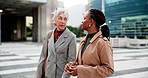 Walking, discussion and business women in city for meeting, talking and planning on morning commute, Professional, flare and worker with assistant for conversation on travel, trip and journey to work