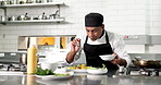 Sauce, man and chef in kitchen for plating at restaurant for meal preparation, presentation or cooking. Food, hospitality career and male culinary worker for cuisine flavor with catering at diner.