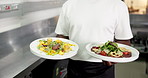 Restaurant kitchen and hands of waiter with food for serving gourmet dish, cuisine and meal. Hospitality, catering and person with plate for service, customer order and walking for lunch or dinner