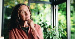 Break, plants and thinking with woman in home for contemplation, memories or reflection. Greenery, ideas and relax with mature person in conservatory for inspiration, nostalgia or perspective