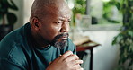 Home, thinking and black man with reflection, retirement and sad with mental health. Mature person, african guy and pensioner with nostalgia, memory and doubt with daydreaming in house lounge
