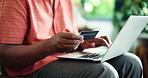 Hands, person and credit card with laptop at house for ecommerce, fintech and transaction. Man, pc and check details for online shopping, easy payment and banking information of purchase subscription