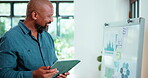 Happy, man and tablet in office with whiteboard for data analysis, finance info or business management. Mature black person, graphs and typing with tech, analytics report or annual financial results.