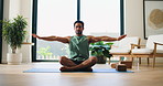 Meditation, stretching and yoga with man in home studio for balance, inner peace or mindfulness. Exercise, flexibility and zen with yogi person in apartment for holistic health or wellness routine