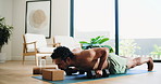 Man, fitness and weightlifting with push ups or dumbbells in home for exercise, muscle or training. Active, muscular or male person with equipment or weights for core or arm workout on mat in house