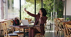 Happy woman, selfie and laptop with peace sign in cafe for memory, picture or capture moment. Female person, customer or user with smile, emoji or post for photography or social media in coffee shop