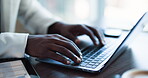 Hands, person and typing with laptop in office for research, data entry and insurance report. Broker, pc and tech for claims process application, policy renewal and customer portfolio for coverage
