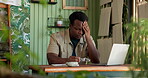 Flower shop, stress and man with laptop, headache and sad for financial loss, think or mental health. Entrepreneur, burnout and black person with tech for sustainable business, reflection and anxiety