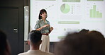 Business woman, statistics and presentation for training in seminar room with audience. Education, forum speech and graphs with corporate growth for public speaking, strategy and convention for crowd