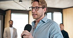 Advice, business and microphone with motivational speaker man in office for life coaching. Crowd, inspiration and speech with person in workplace for employee development, pep talk or support