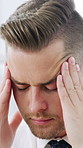 Headache, stress and businessman in office with fatigue, burnout or exhaustion with mistake. Frustration, migraine and male corporate employee with pressure, brain fog or strain in workplace.