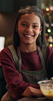 Face, kid and baking at house for Christmas holiday, cake mixture and homemade dessert. Portrait, smile and child with batter preparation of sweet treat, festive tradition and cookies for celebration