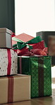 Christmas, home and gift in lounge, boxes and celebration with festive season, parcel and ribbons. Xmas, empty and present with tradition, party and decoration with package and surprise in December
