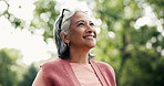 Breathe, thinking and senior woman outdoor for fresh air, wellness and active hobby for health. Park, happy and elderly person in nature for exercise, fitness and workout for wellbeing, rest and calm