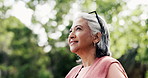 Thinking, senior woman and travel outdoor with vision, fresh air and calm morning on holiday. Thoughts, elderly person and bokeh with reflection, sightseeing and scenery view of nature on vacation