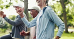 Old woman, hands and group exercise at park for functional fitness, warm up routine and cardio. Active retirement, senior people or happy with instructor outdoor for brisk walking or mobility workout