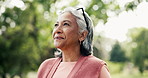 Thinking, senior woman and breathing outdoor with vision, fresh air and calm morning on holiday. Thoughts, elderly person and bokeh with reflection, sightseeing and mindfulness in nature on vacation