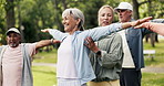 Instructor, fitness and old people in park, help and support with wellness, talking and advice. Outdoor, mature men and women with exercise, pilates and nature with health, morning routine or trainer