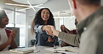 Meeting, people and handshake with applause in boardroom for congratulations, welcome and recruitment. Happy businesswoman, shaking hands and group clapping for new hire, introduction and onboarding