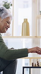 Caregiver, old woman or play chess in nursing home for cognitive function, strategy or bonding together. Nurse, elderly person or board game in retirement center for connection, contest or challenge.