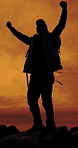 Man, silhouette and mountain with fist pump, sunset sky or shout for goals on summer adventure. Person, celebration and success with achievement, cheers and trekking journey on hill, rocks or summit