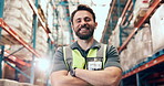 Arms crossed, face and logistics with man in warehouse for delivery, distribution or shipping. Packaging, supply chain and quality control with happy person in storage depot for import or export