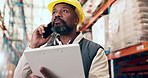 Supply chain, man or phone call in warehouse with clipboard for shipping, logistics or discussion. Low angle, mature black person or talk in depot with tech, checklist or contact for quality control.