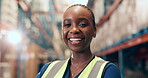 Confidence, face and smile of black woman in logistics warehouse for distribution or shipping. Inventory, supply chain and quality control with happy African employee in storage depot for delivery