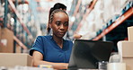 Laptop, logistics and businesswoman in warehouse with typing for email with ecommerce details. Computer, boxes and female supply chain manager with online information for cargo delivery in factory.